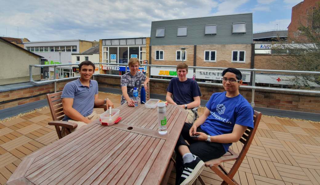 Enjoying lunch with some of my colleagues on the office balcony. 