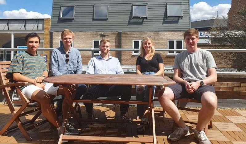 Basking in the sun with my fellow interns. From left to right: Marcos, Preben, Callum, me and Rory.